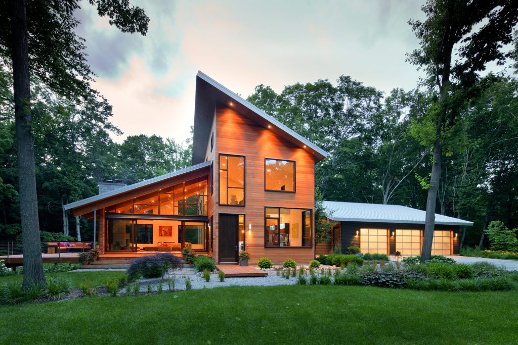 Modern wood residential home by West Michigan Lucid Architecture