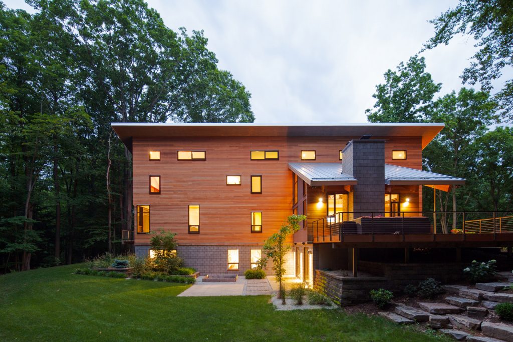 Modern wood residential home by West Michigan Lucid Architecture