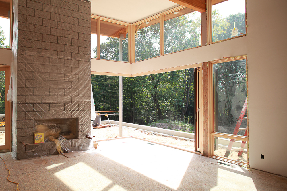 Lucid Architecture dogwood modern construction living room slider door bifold nanawall