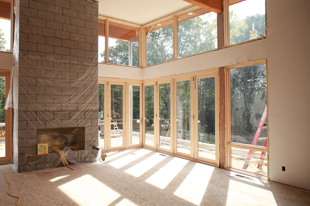 Lucid Architecture dogwood modern construction living room slider door bifold nanawall